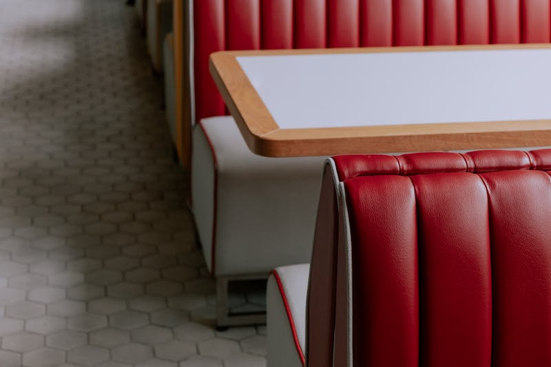 Cozy booths inside Dewey's pizza restaurant